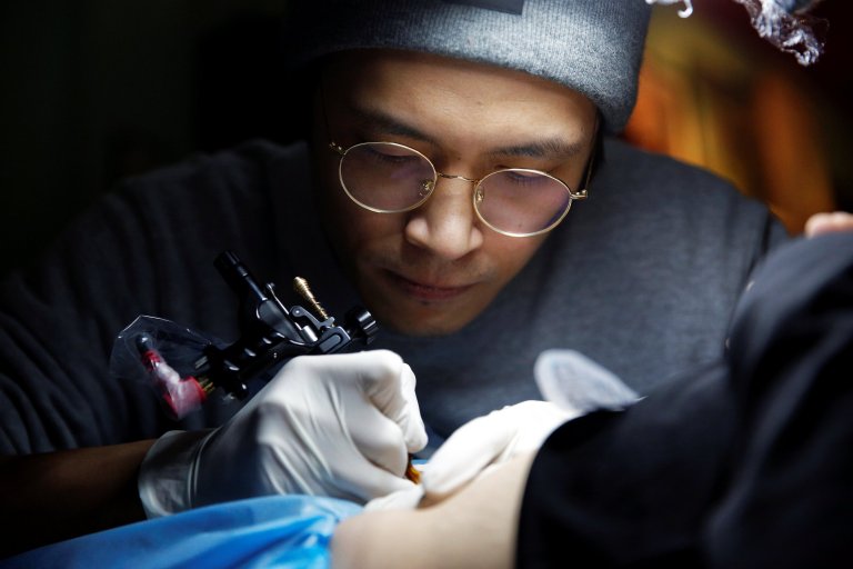 tattoo artist cover up child birth mark